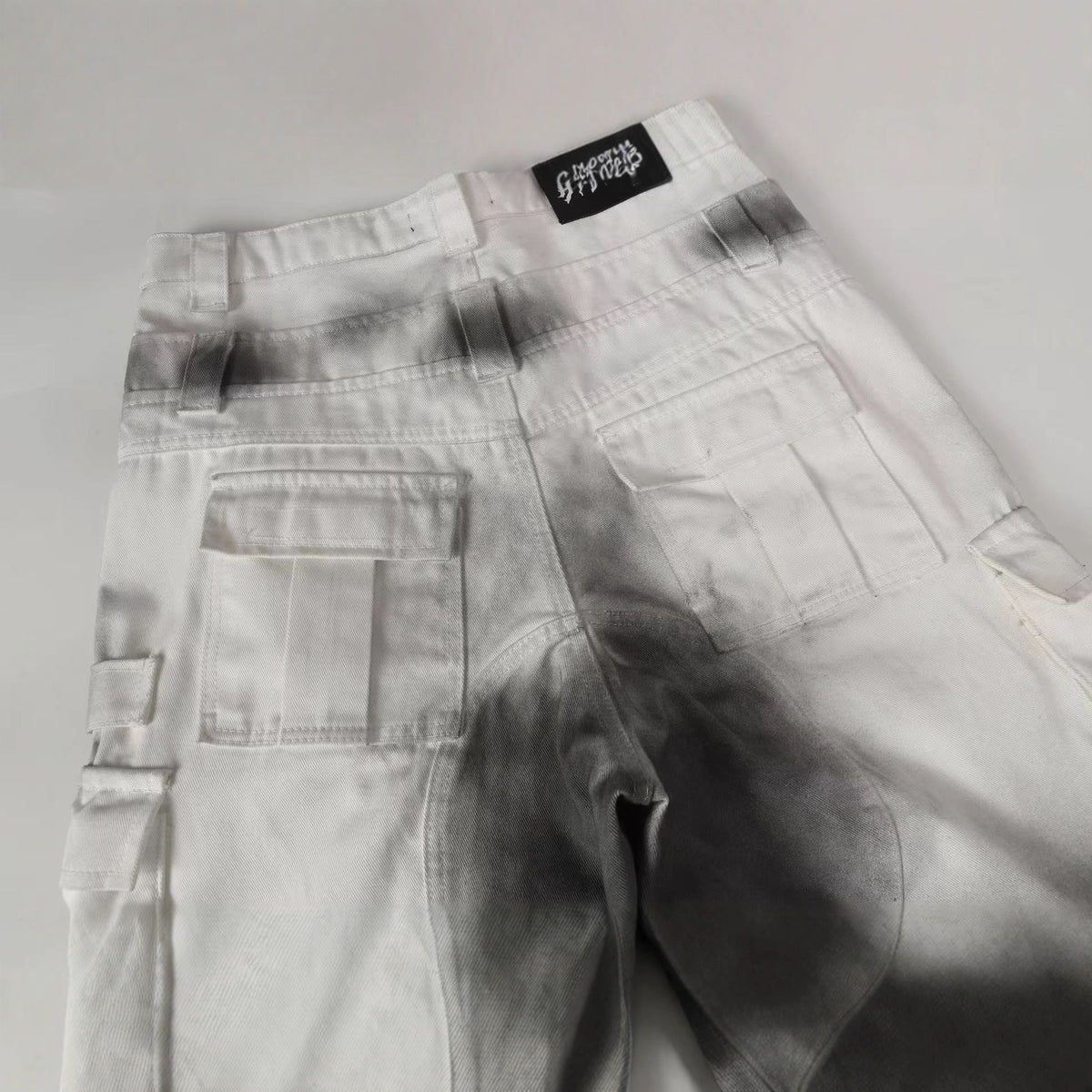 Inkjet multi bag dark workwear wide leg pants